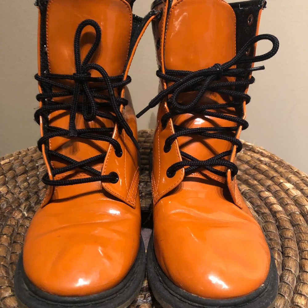 Orange lace up boots